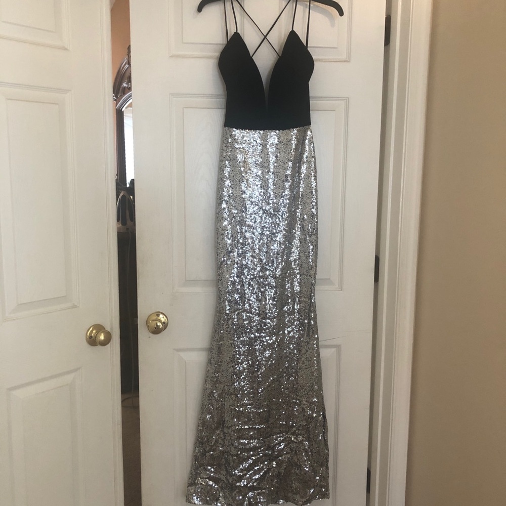 Long elegant sequin and black prom gown.